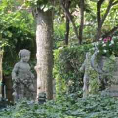 The statues throughout the garden are original to the house.