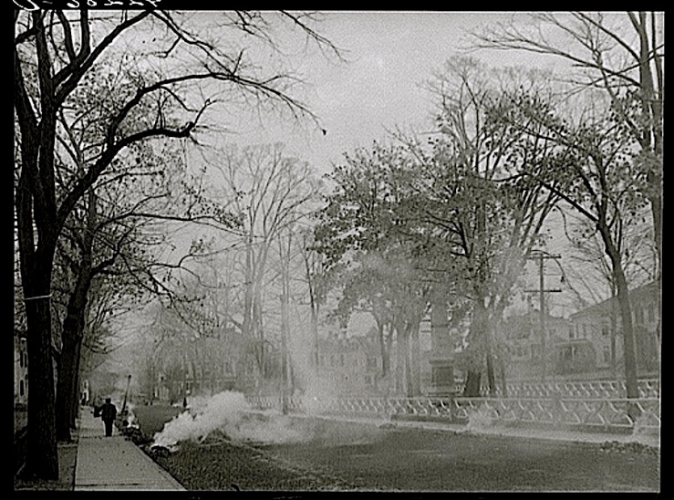 Burning the autumn leaves on Broadway in Norwich, Connecticut, 1940, by Jack Delano, Library of Congress